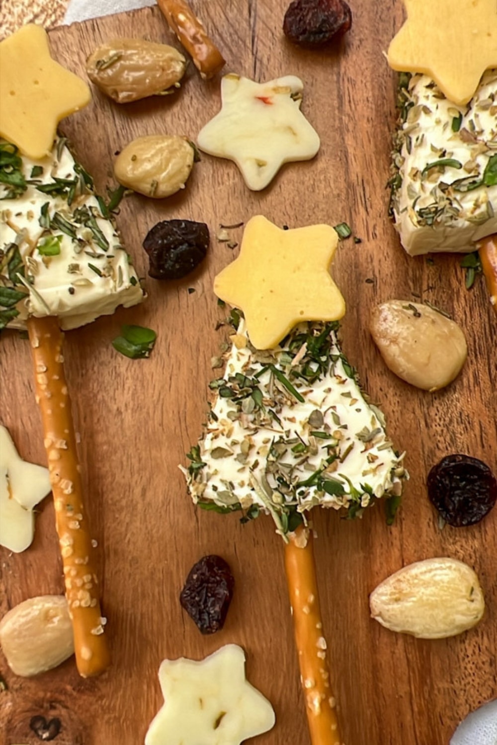 Christmas tree cheese appetizers on a serving board