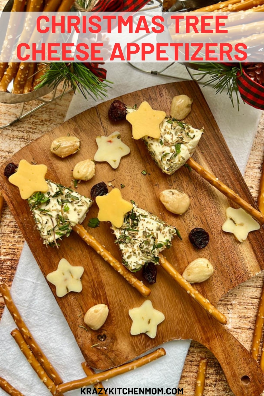 Turn “cheese ball” ingredients into festive Christmas trees by rolling store-bought cheese in fresh and dried herbs.  via @krazykitchenmom