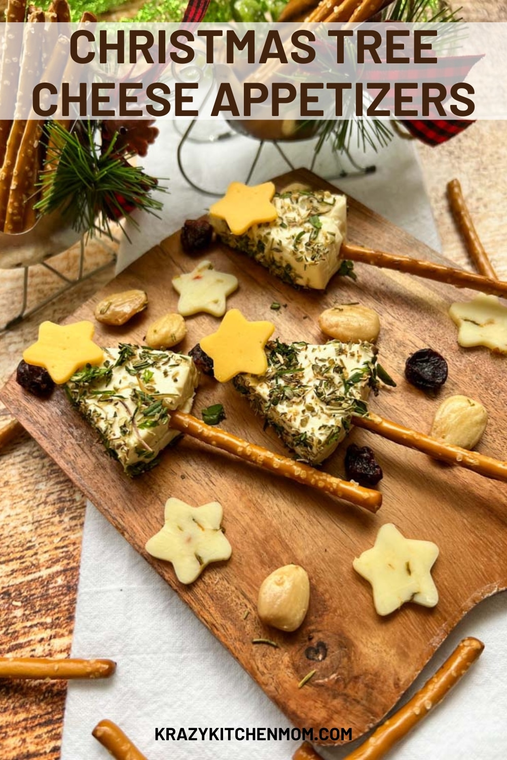 Turn “cheese ball” ingredients into festive Christmas trees by rolling store-bought cheese in fresh and dried herbs.  via @krazykitchenmom