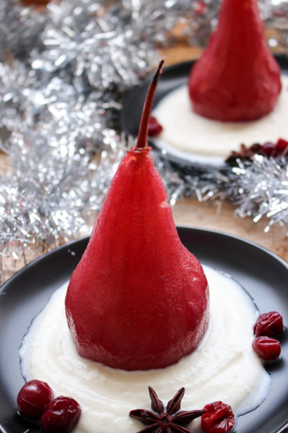 poached pear on a bed of ricotta cheese