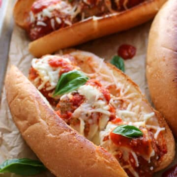 meatballs subs on a baking pan