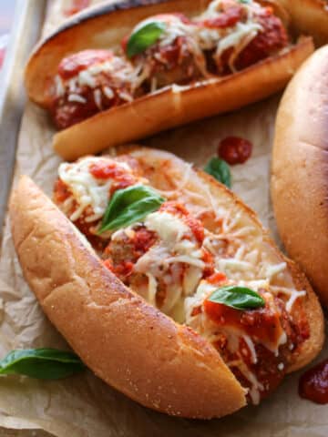 meatballs subs on a baking pan
