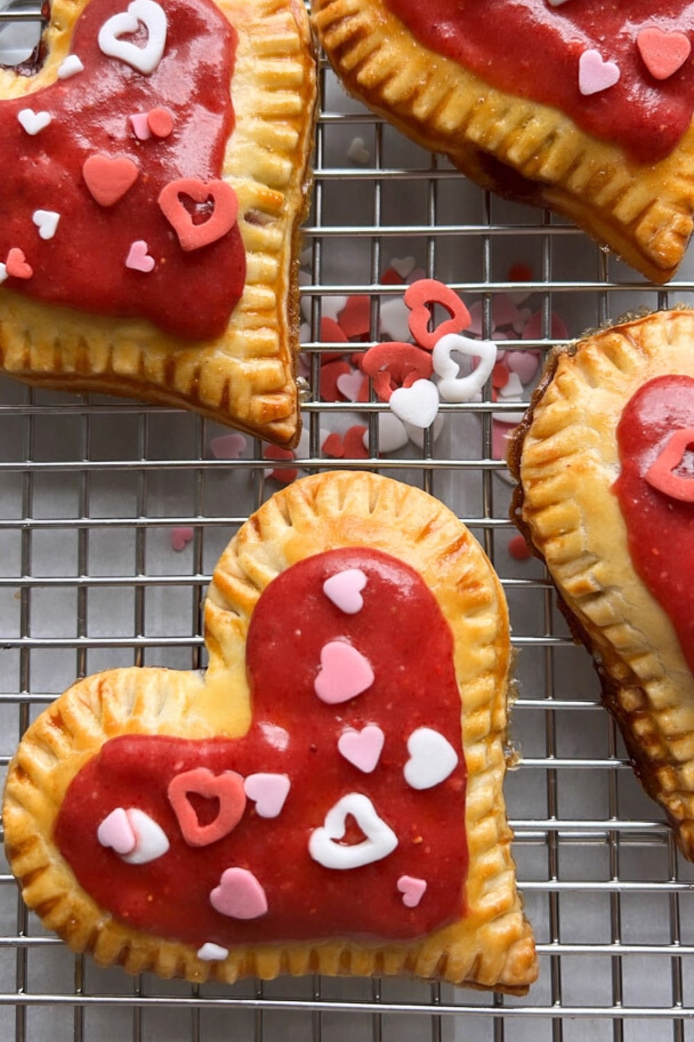 overhead shot of heart-shaped berry pop tarts 