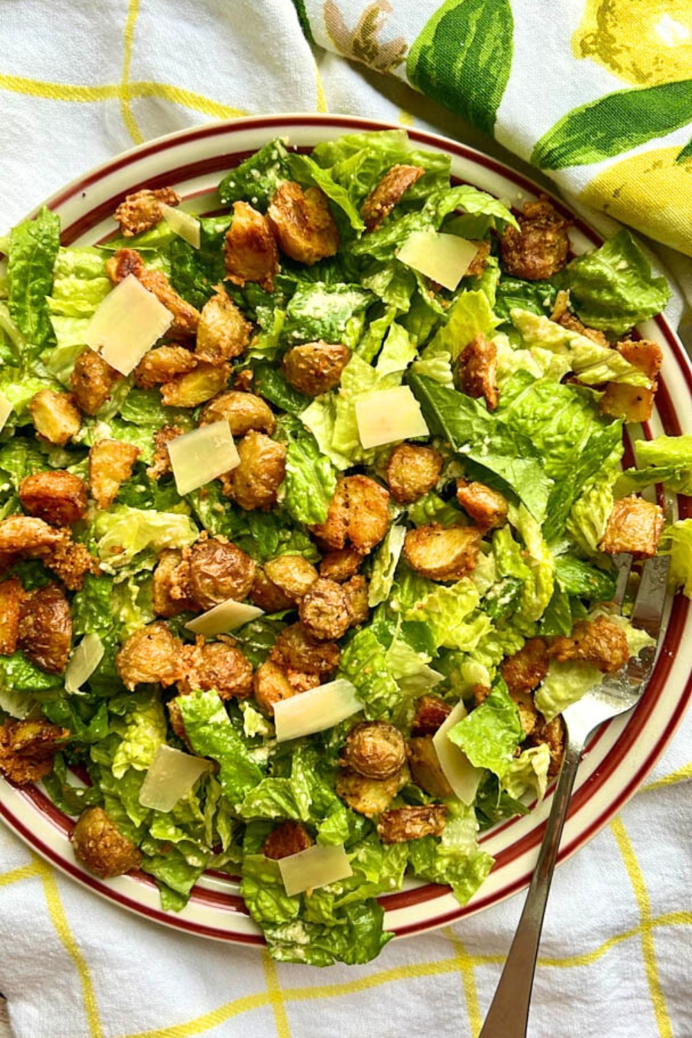 bowl of crispy parmesan potato caesar salad