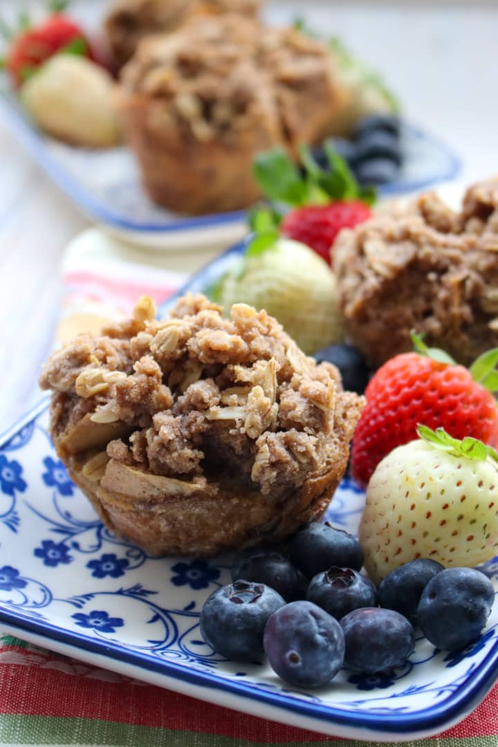 FRENCH TOAST MUFFIN CUP ON A PLATE WITH STRAWBERRIES