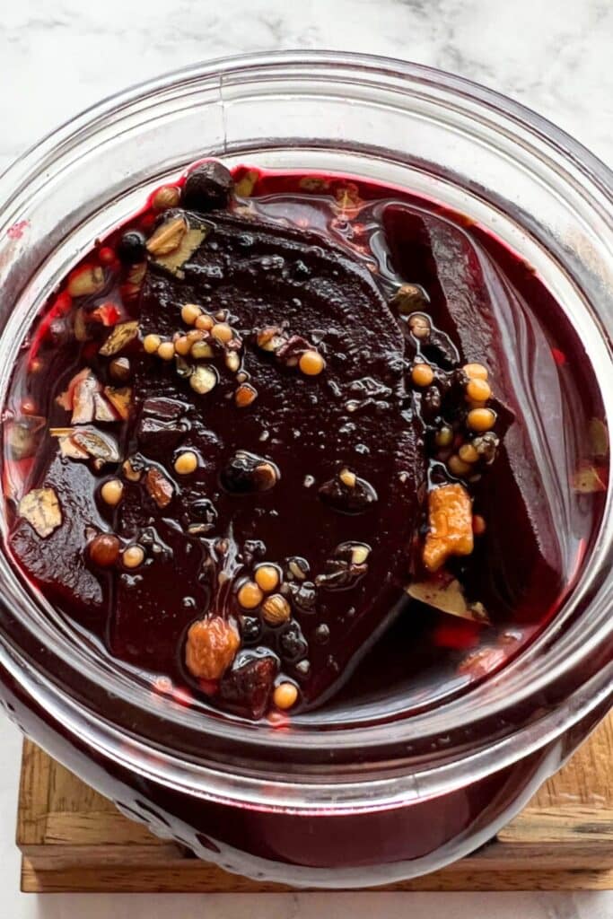 overhead shot of jar filled with pickled beets