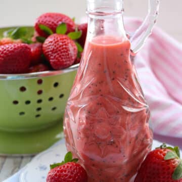 carafe of strawberry poppy seed salad dressing