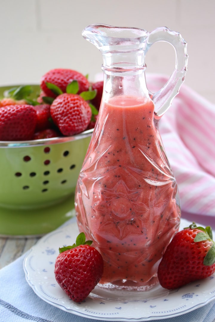 carafe of strawberry poppy seed salad dressing