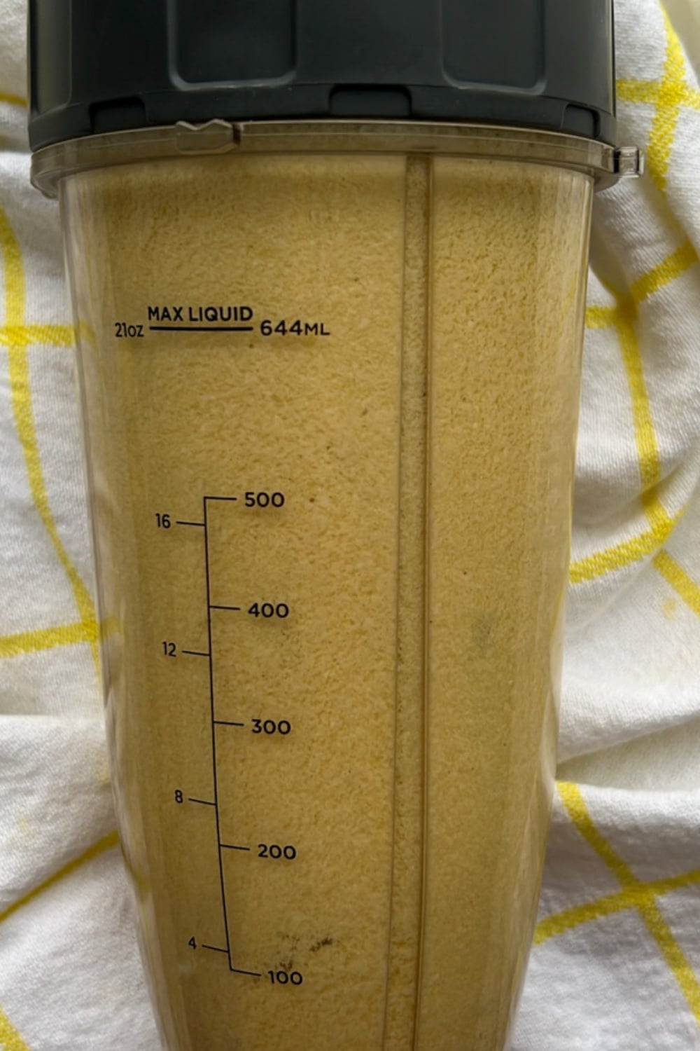 Caesar salad dressing in a blender cup