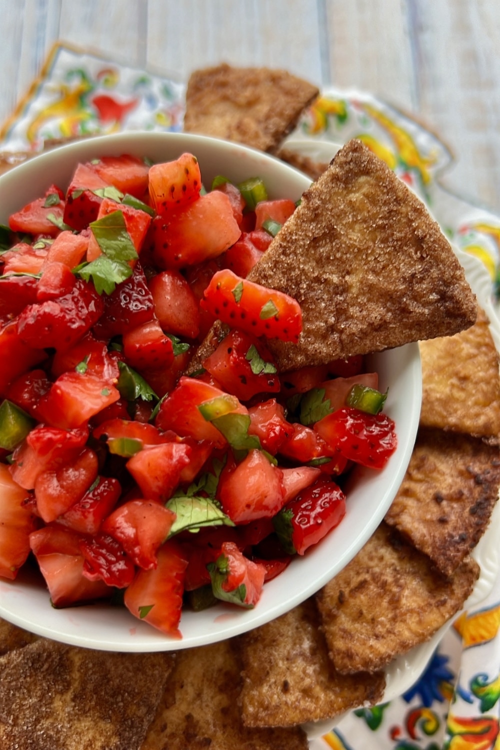 BOWL OF STRAWBERRY SALSA WITH CINNAMON CRISP