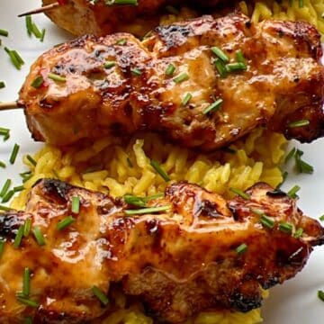 bang bang chicken skewer on yellow rices