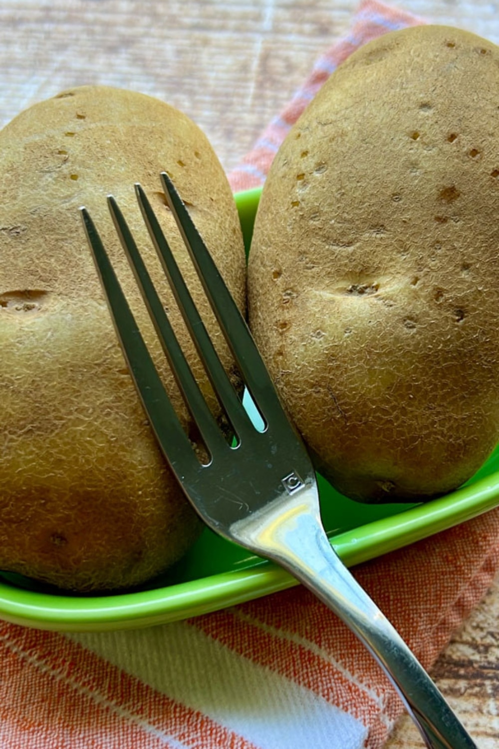 two baked potatoes