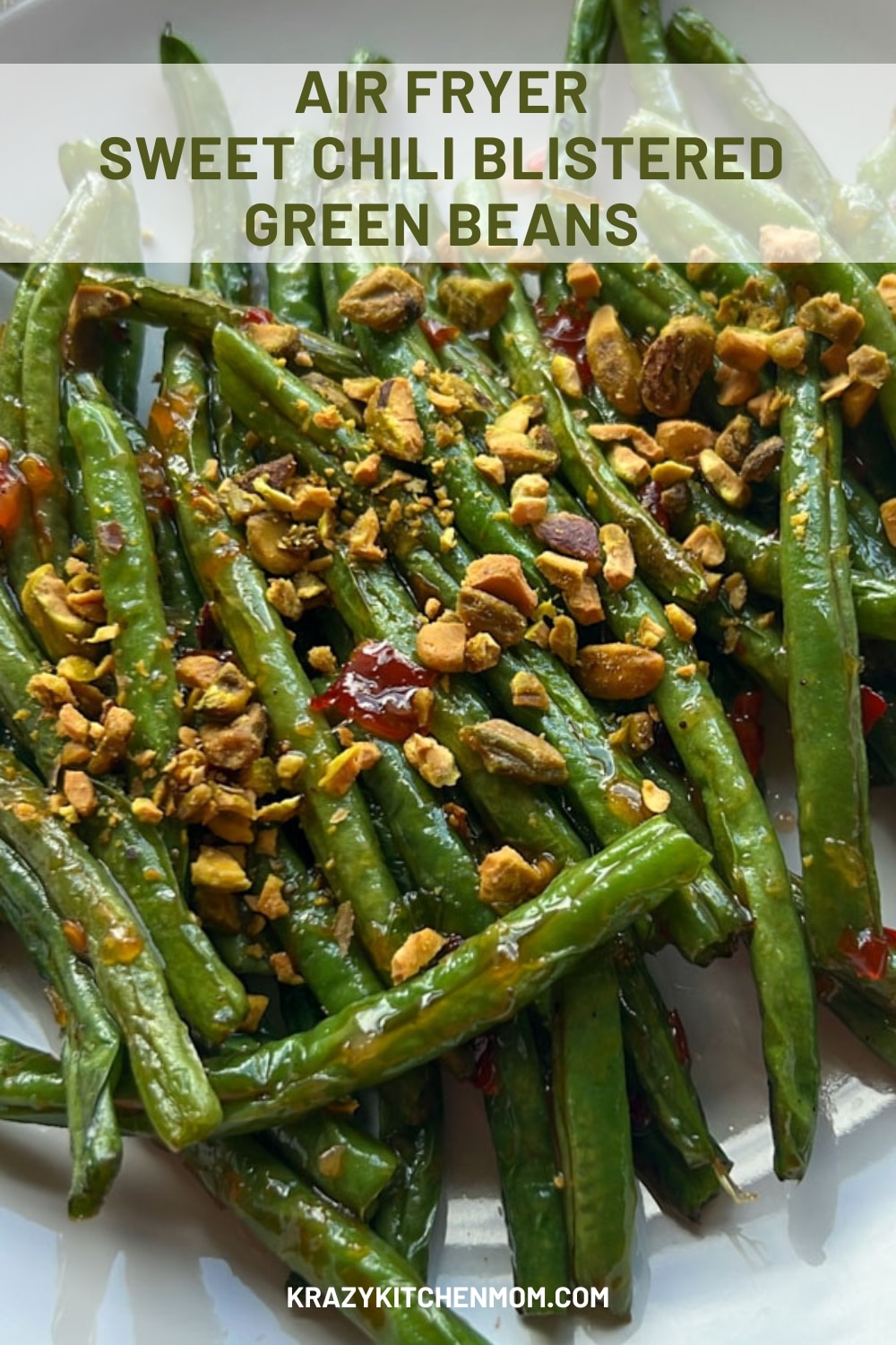 Easy, quick, sweet, and spices air fryer green beans are a perfect side dish. They blister just enough to keep them tender but still have a good bite. via @krazykitchenmom
