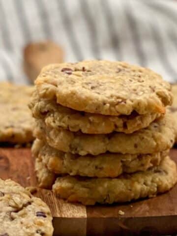 tower of CHEESY PECAN OAT CRISPS