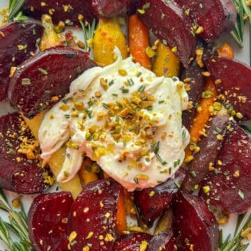 platter of honey maple roasted beets and carrots with burrata cheese