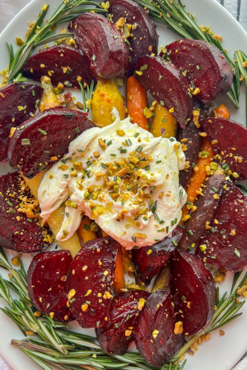 platter of honey maple roasted beets and carrots with burrata cheese