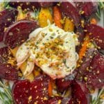 platter of honey maple roasted beets and carrots with burrata cheese