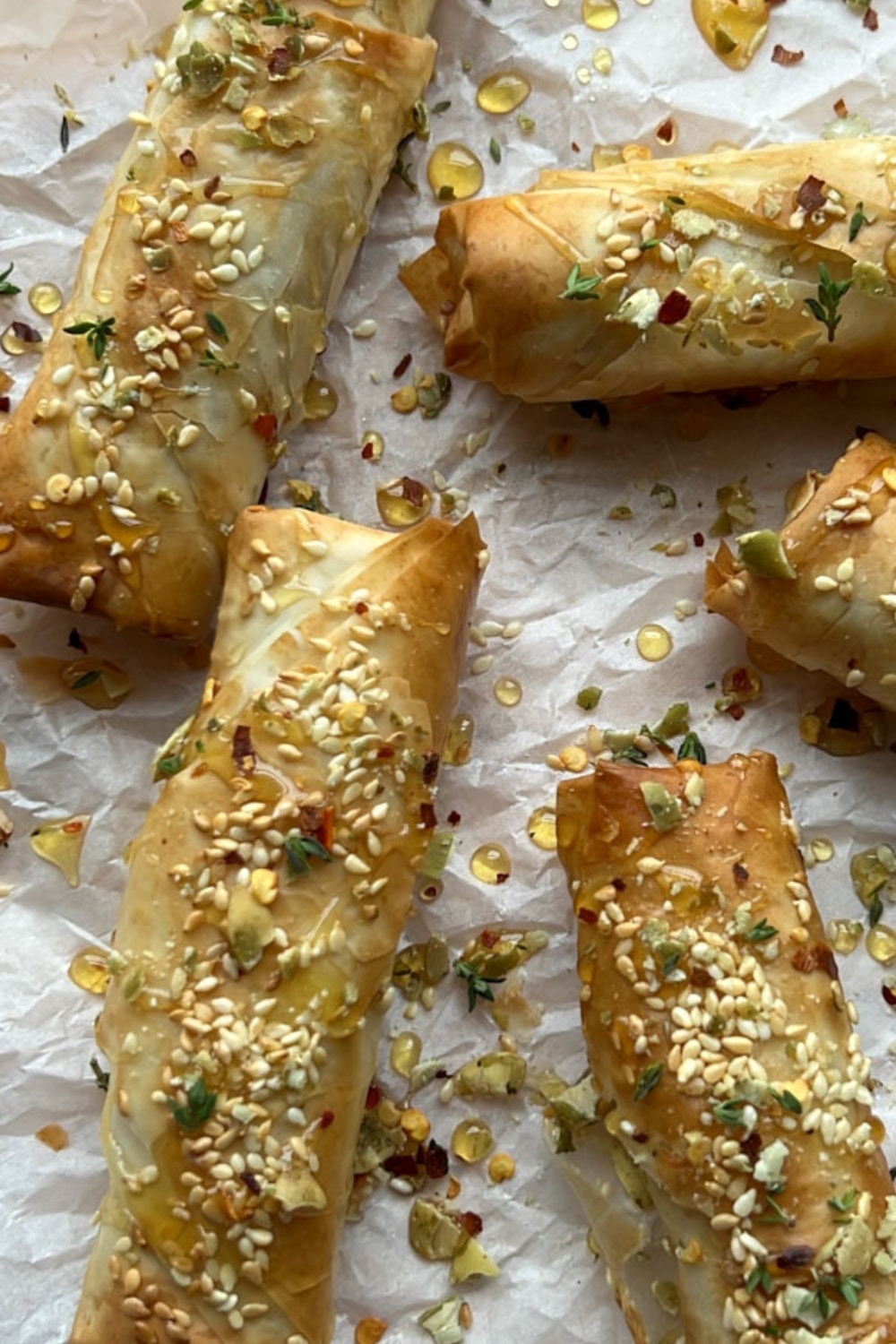 CRISPY AIR FRYER FETA ROLLS TOPPED WITH HONEY AND SESAME SEEDS