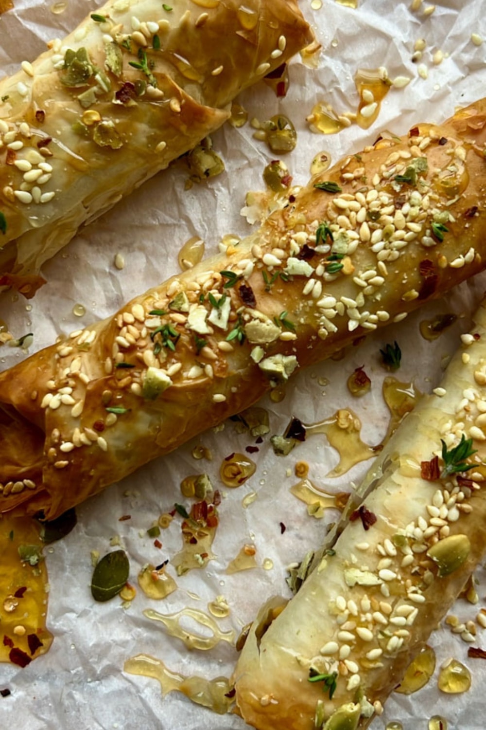 AIR FRYER FETA ROLLS TOPPED WITH HONEY AND SESAME SEEDS