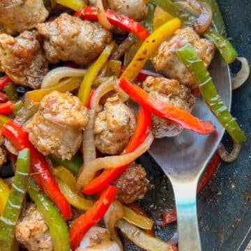 close up of sausage, onions, peppers