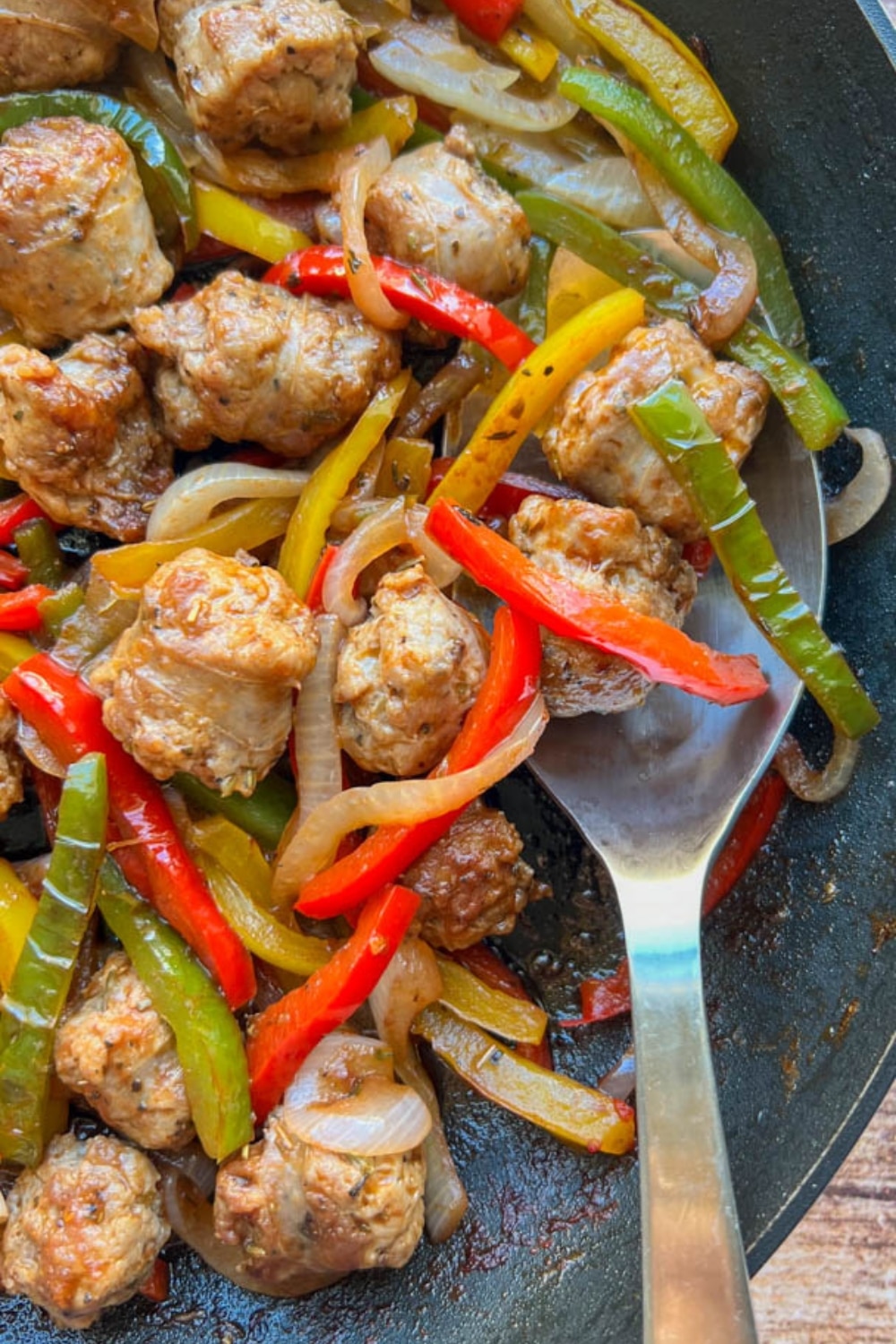 close up of sausage, onions, peppers