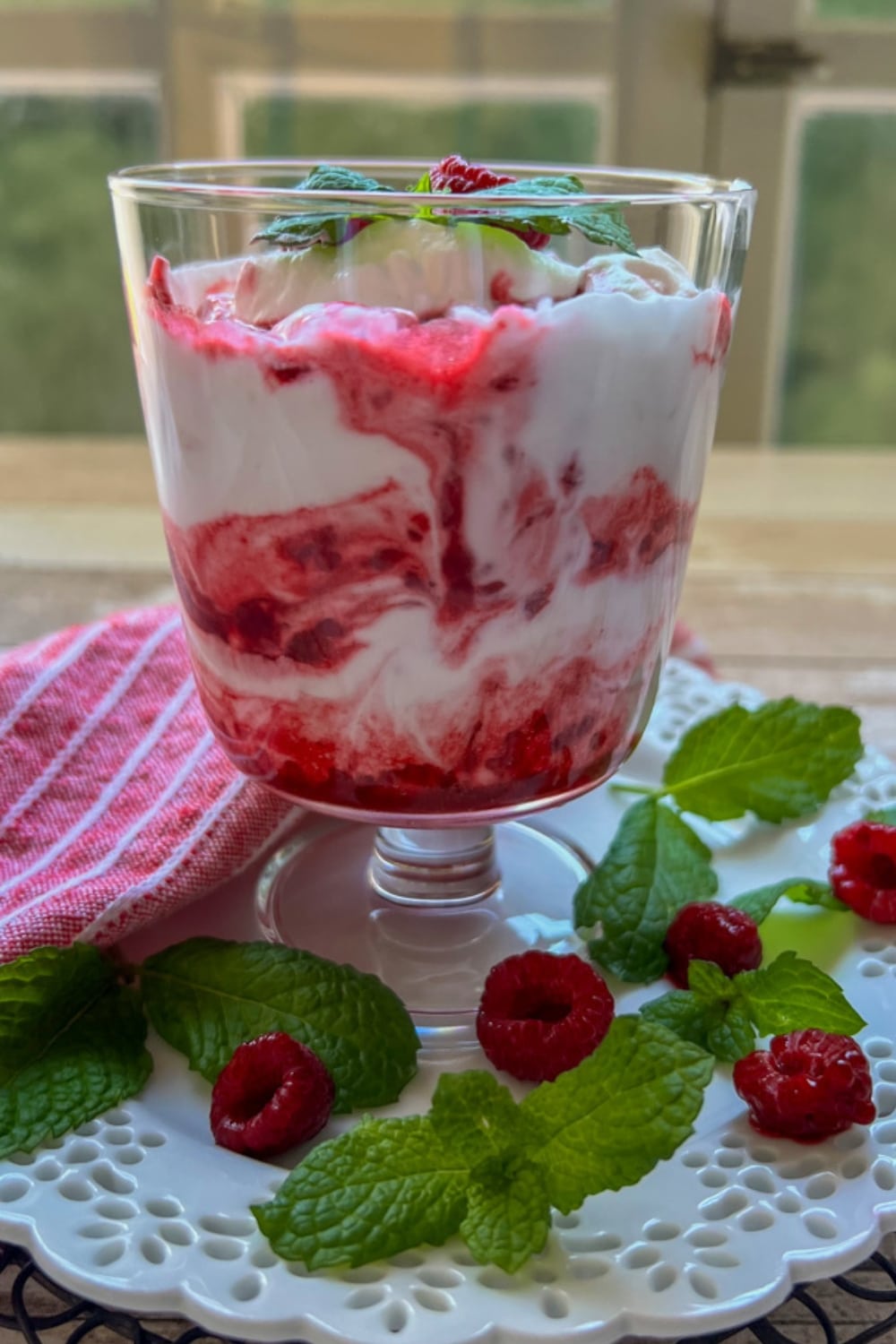 large dessert dish of raspberry fool berries and cream